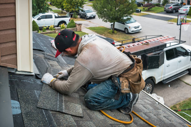Professional Roofing technician working in Quaker City, OH